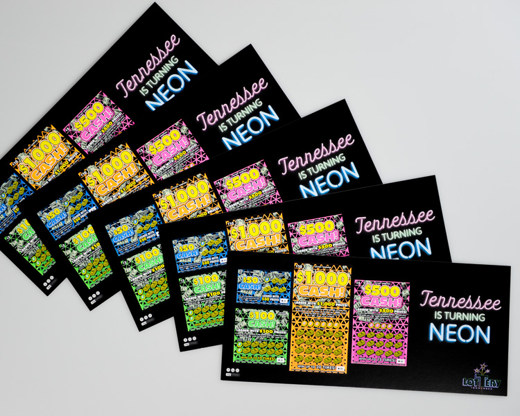 Tennessee Lottery display toppers arranged with neon scratch-off games