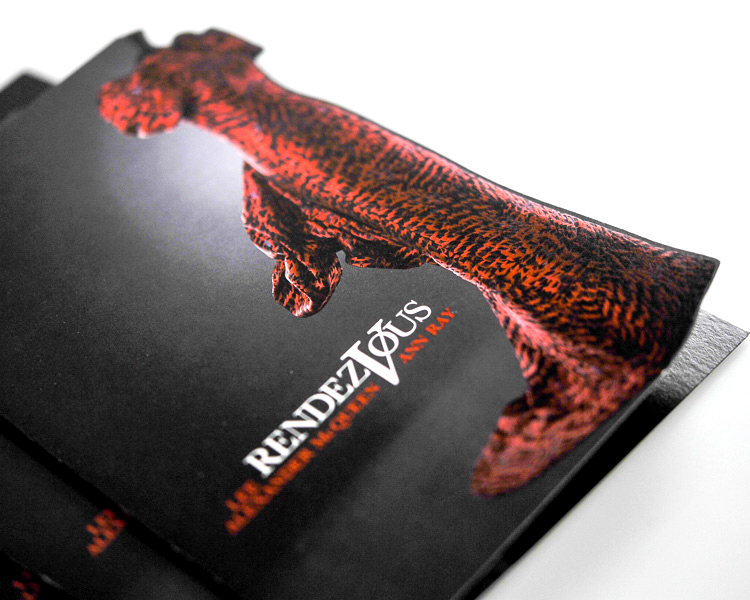 Close-up die-cut detail on museum invitation