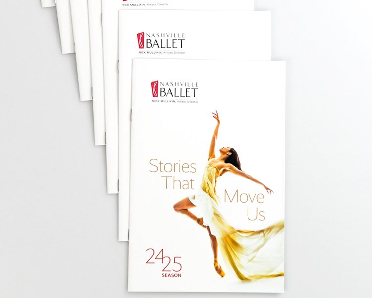 Multiple printed copies of Nashville Ballet Stories That Move Us season brochures