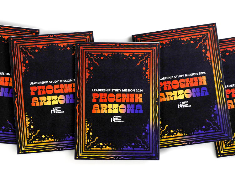 Stacked Phoenix Arizona Leadership Study Mission booklets