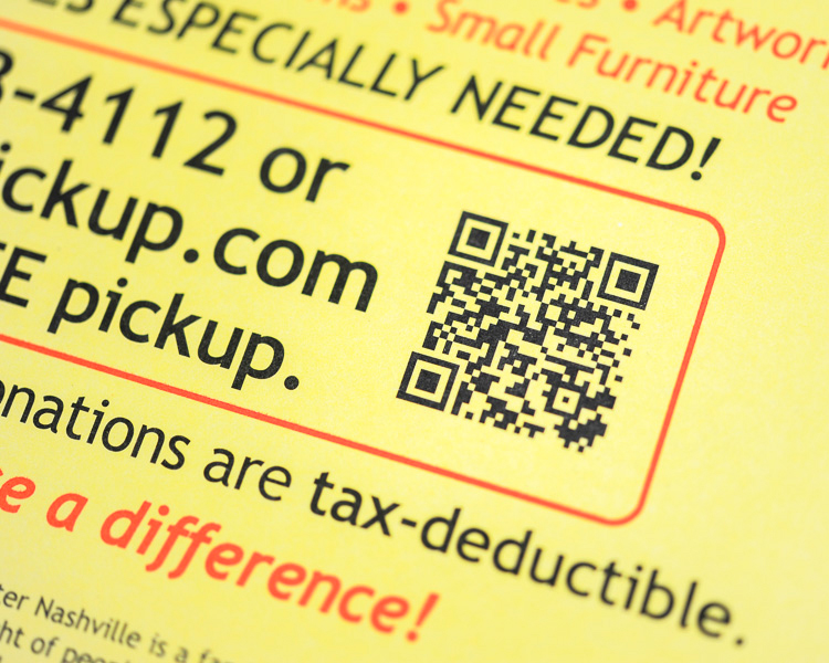 Back side of The Arc direct mail postcard with QR code and mailing panel